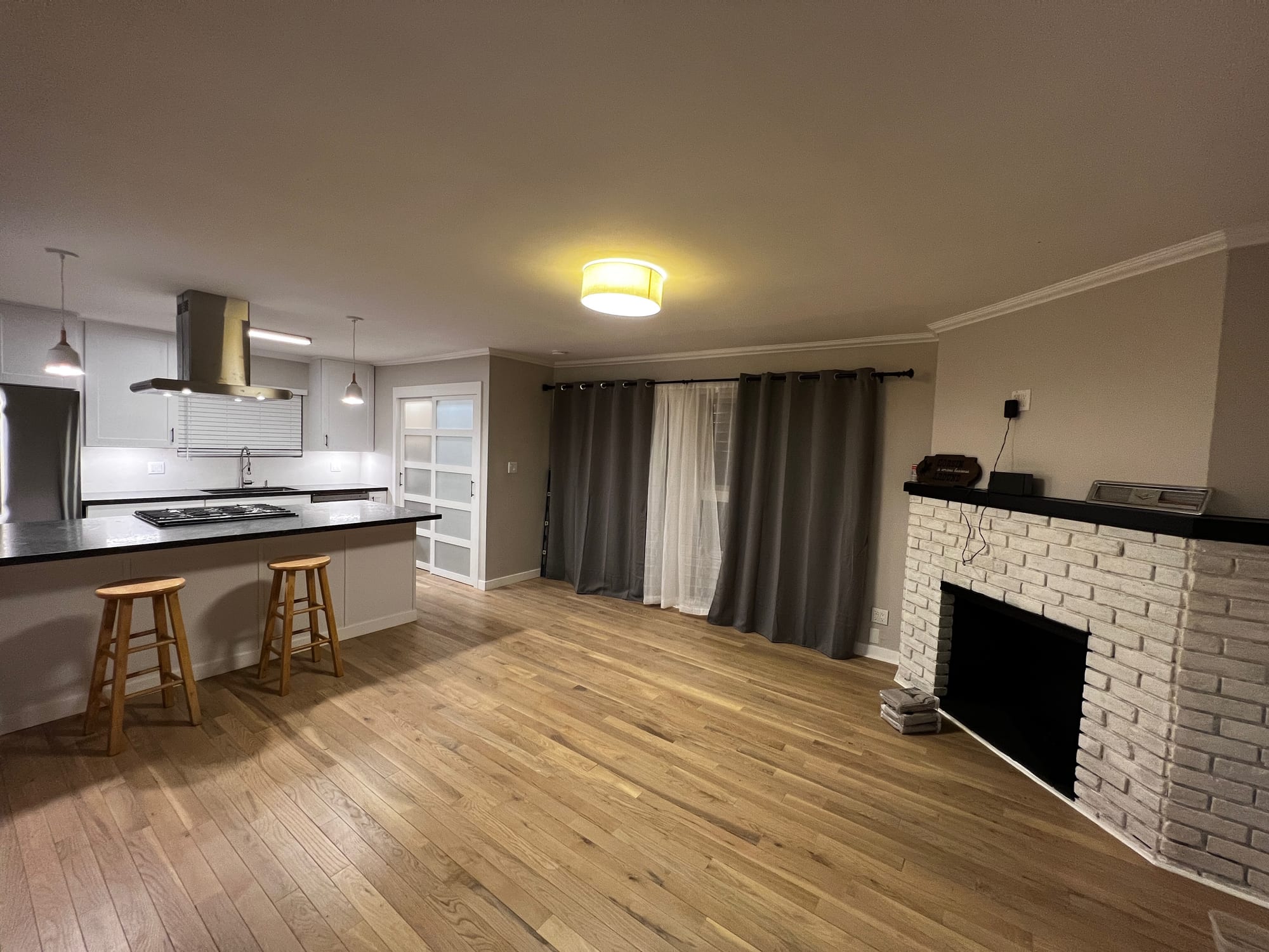 Finished kitchen with island and open living space